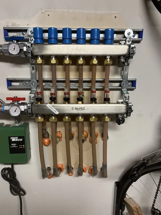 Plumber performing Water Heater Repair at a residential property in Heber Springs